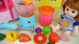 Fruit juice maker and baby doll kitchen play