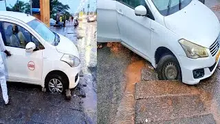 Within A Span Of 5 Minutes, 2 Cars Fell In The Open Gutter | Outside Inter State Bus Stand Mapusa.