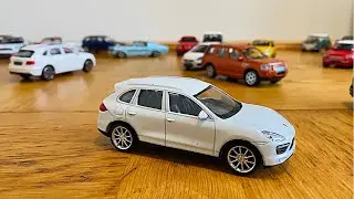 Various Smaller Model Cars Being Stopped By Hand - 4K Video