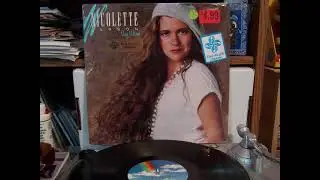 Nicolette Larson building bridges 