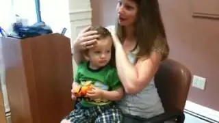 Josef is a little skeptical before his first haircut