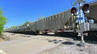 NS 4676, 4516 & 7664 muscle the heavy, southbound grainer past Clonts Rd