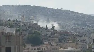 Smoke rises over Jenin as Israeli military raid into West Bank goes on