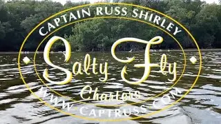Sight fishing Redfish on fly onboard the Salty Fly.