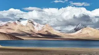 Breathtaking Himalayan Paradise: Where Snow-Capped Peaks Meet Crystal Clear Lakes & Endless Skies