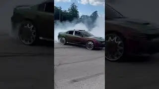 SRT POWERED scat pack  charger doing donuts on 26s