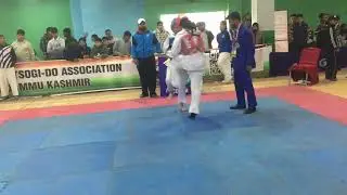 Agrita Chadha  red chest guard￼