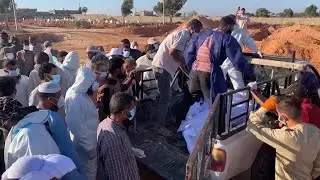 Search teams bury flood victims in Libya, public prosecutor vows criminal cases over dam disaster
