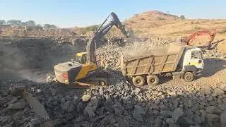 # volvo ec 210 #excavator # indus rock tool #jcb #automobile # stone  loading # leyland 2820 AVTR 