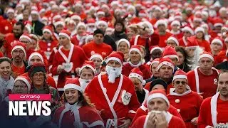 4,000 runners in Santa Claus costumes join race for charity near Paris