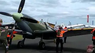 Spitfire parking and Red Arrows passage