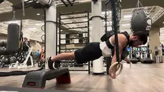 Weighted Ring Push Ups (7 reps 40 lbs)