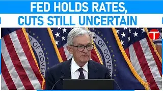 Fed holds rates steady, sees 'elevated' inflation and stabilizing job market