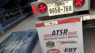 Unloading frac sand with a pneumatic trailer