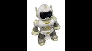 Interactive Dancing Robot with Lights, Music, and Rotating Dance Moves