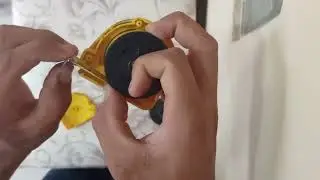 trocando mola de uma trena
