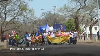 Eswatini activists protest US deportation deal at embassy in South Africa