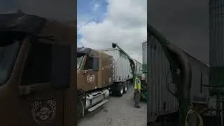 loading corn gluten pellets from a railcar with a vacuum system