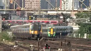 South Western Railway 444022 and 444008 passing Clapham Junction