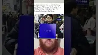 A Japanese man stands with his newly purchased PS2 on launch day.