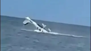 A plane crashes into the Atlantic Ocean in a dramatic video.