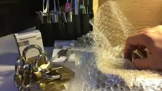 (054) Package from Oceanaut - Master Lock V Line 4150 picked out of the box
