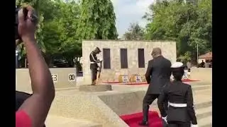 President John Mahama lays a wreath and lights the perpetual flame on behalf of the Government of Gh
