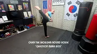 Over the Shoulder Roundhouse kick or Question Mark Kick