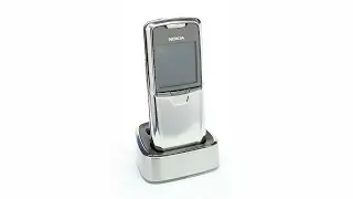 Used Nokia 8800 Silver In Good Condition With His Original Charging Dock - Revolving 360 Degree