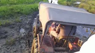 HMT 3511 out from mud with help of heavy iron chain on Tyre
