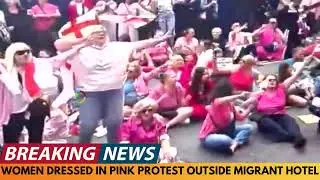 BREAKING NEWS: WOMEN AND CHILDREN IN PINK PROTEST OUTSIDE MIGRANT HOTEL