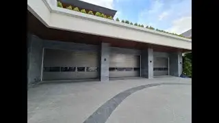 Oversize garage doors in metallic color RAL9007 by A+