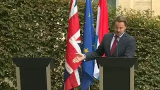 Luxembourg PM tells Johnson 'the clock is ticking' on brexit | AFP