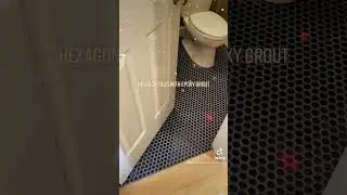 Mosaic floor tiles installed with stain resistant grout