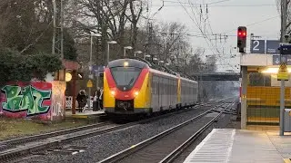 Regionalbahn nach Hanau auf der RB58 (24341) - Hessenbahn GmbH und ein Flixtrain f&auml;hrt durch Maintal