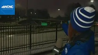 West Charlotte's road covered by dense sleet, ice
