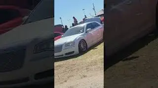 Sideways Ford and Mini trucks with speakers and dancing bed at #LST