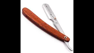 Loading a blade into a Antiga and Parker shavette.