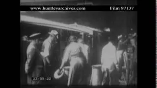 Milk Churns Loaded into Railway Wagon.  Archive film 97137