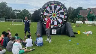 Charlie Savage goes for bullseye at Holiday, Activities and Food camp
