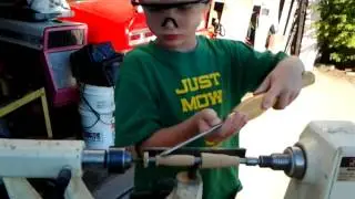 Ethan turning a pen on jet mini lathe