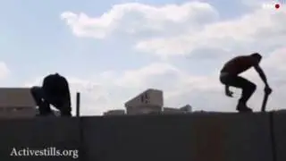 Palestinians scale West Bank Separation Wall