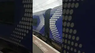 380108 train departing Pollokshields East with a service to Glasgow Central