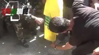 FSA and Syrian civilians burn Hezbollah flag