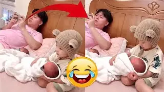 Baby helps dad take care of the child!