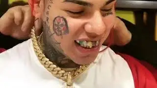 6ix9ine spends 150k on diamond 69 spinning chain