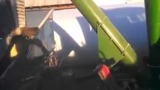 Grinding High moisture corn w/ Lancaster 40 Hammer mill / Ag Bag 6070 10' Bagger in Iowa