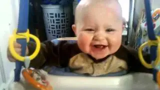 Logan jumping showing his 2 bottom front teeth!