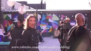 windy fashion show on the roof