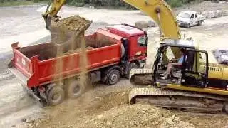 CAT 322C LN loaded Mercedes Actros